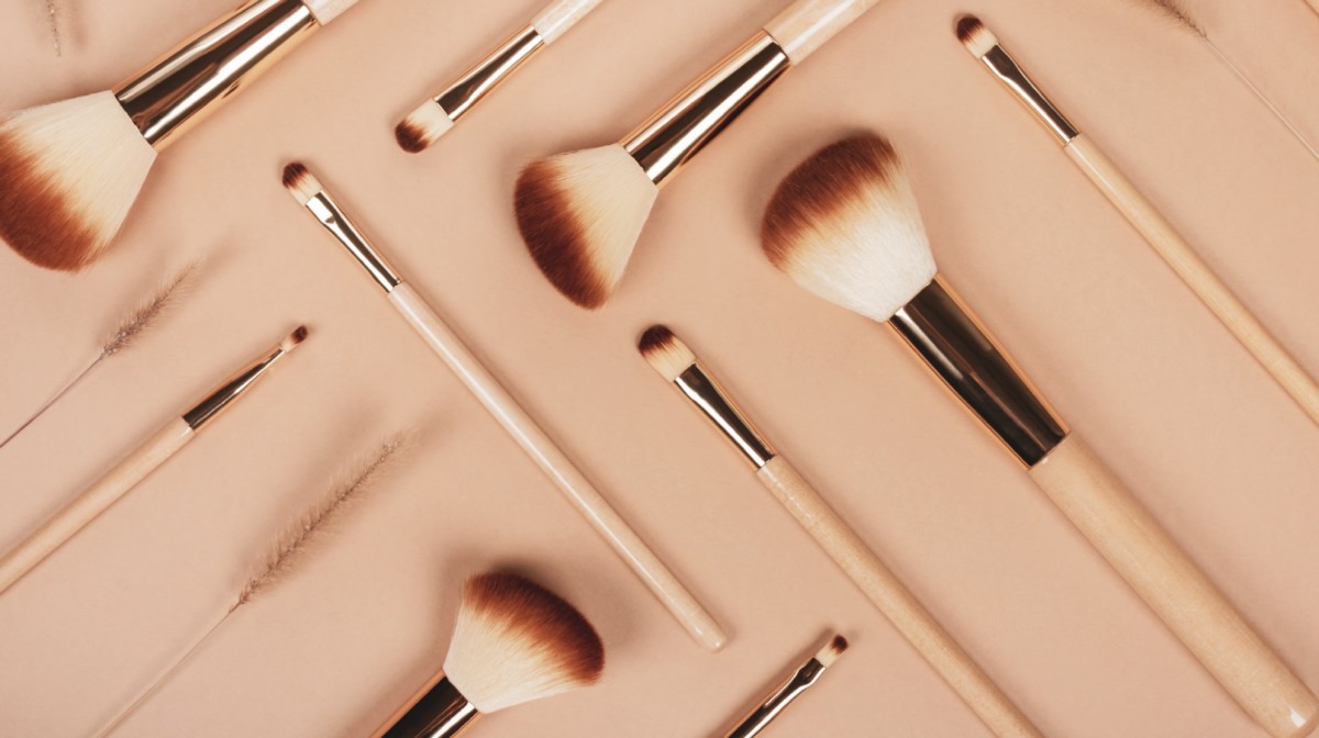 Set of natural wooden makeup brushes.